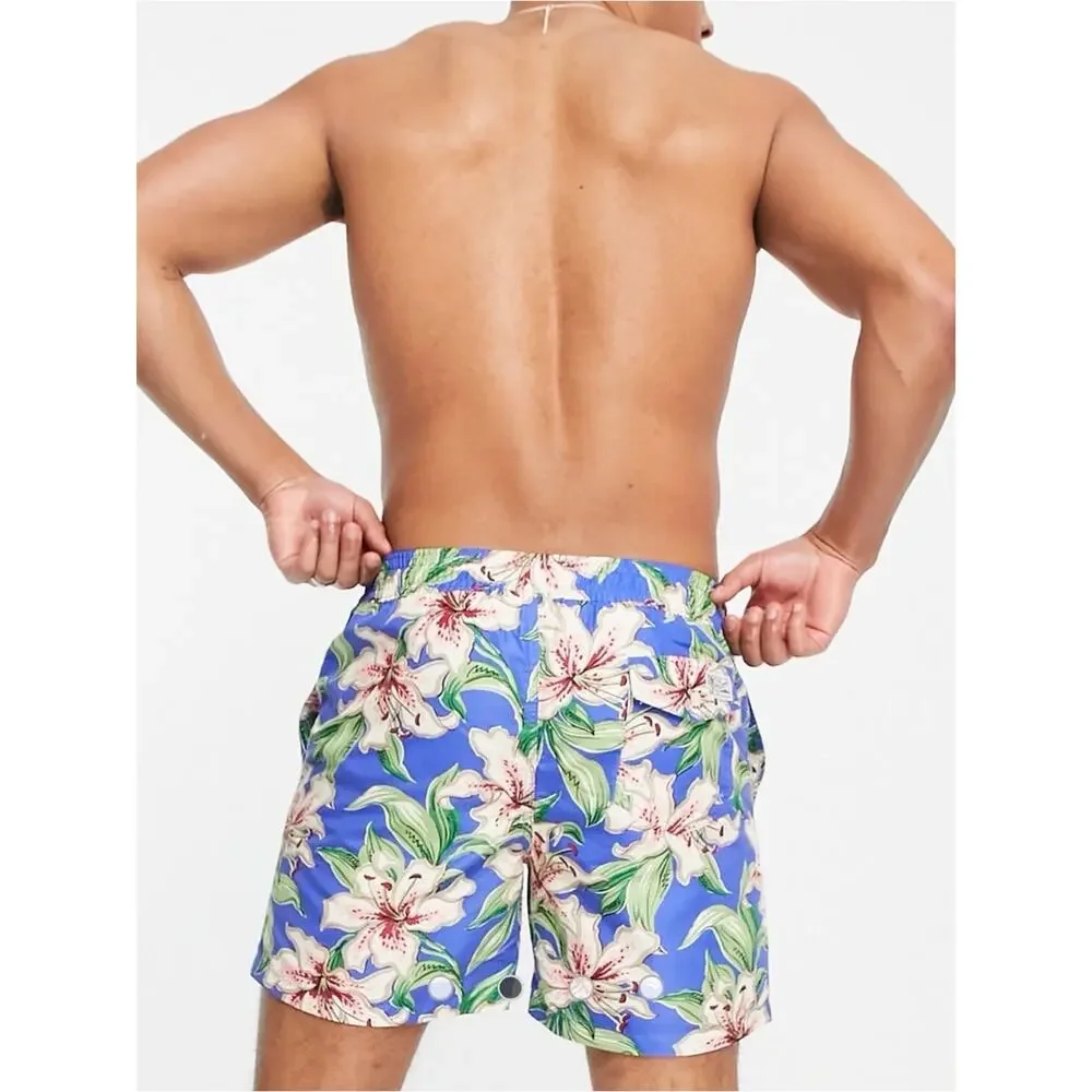 Polo Ralph Lauren Traveler icon logo lilies print swim shorts in blue size XL